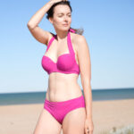 ShowBee SwimIt bikini top and briefs in beautyberry rose color with golden rings, ready to attach our beautiful ShowBee Fantasies. Front view.